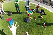 Solving three cubes while juggling them